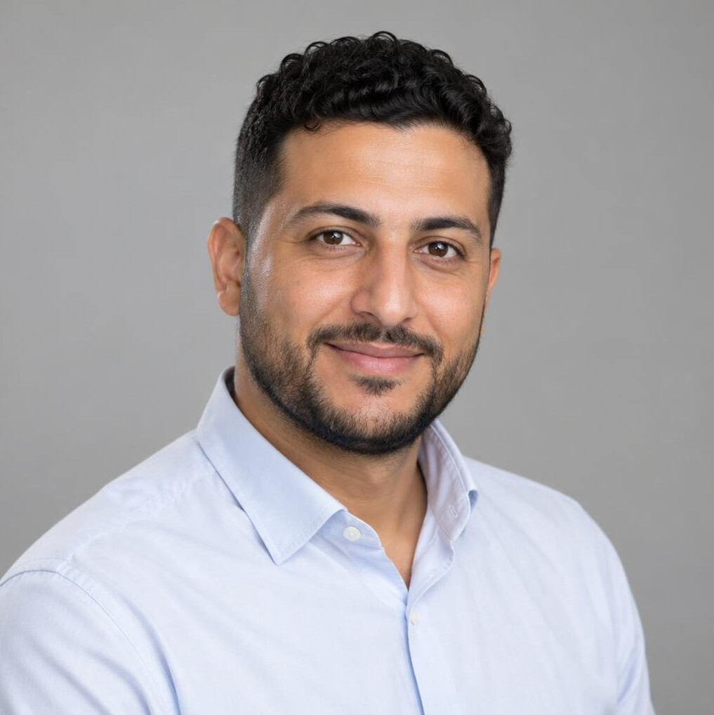 Portrait of a man with short hair and a shirt